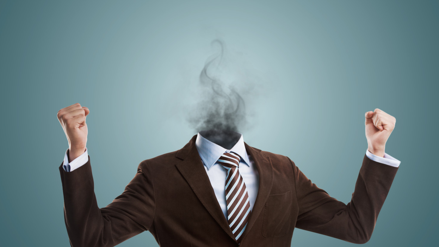 A trader is shown with smoke replacing his head to illustrate losing his cool during trading